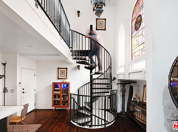 Kitchen/living room space with spiral staircase
