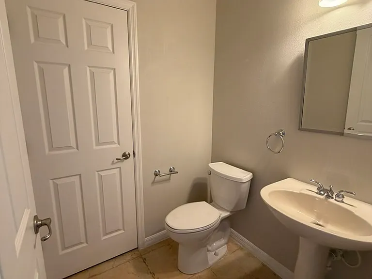 Downstairs half bath with storage
