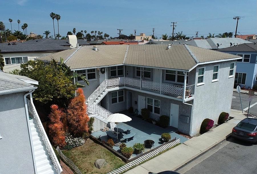 Overhead view of the five-unit side of the property showing community courtyard.