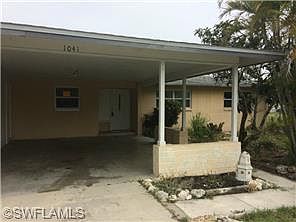 1st image of 1041 NE Pine Island Ln