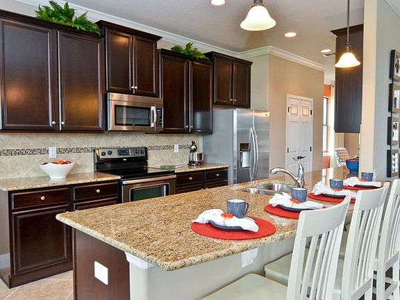Kitchen with Island for Meal Planning at Home or Entertaining with Friends