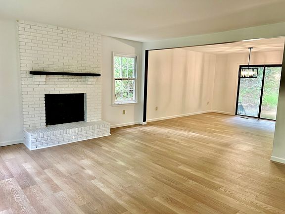 Living room w wood burning fireplace