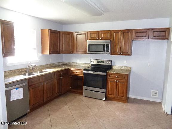 5th image of 8205 Santa Fe Ave