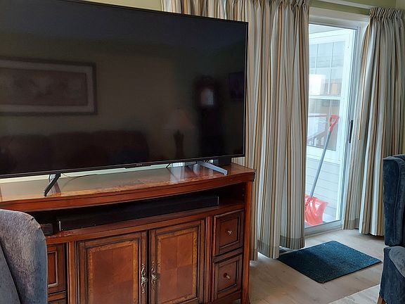 Shared large finished living room with one male roommate age 33