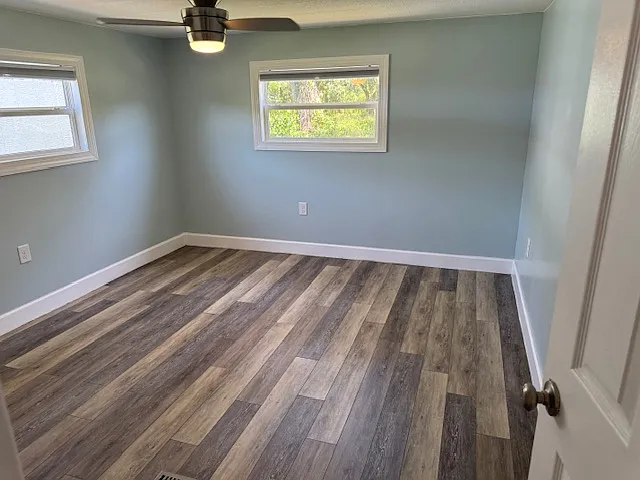 Master Bedroom with new double pane windows, ceiling fan for comfort and night shades to help you sleep.