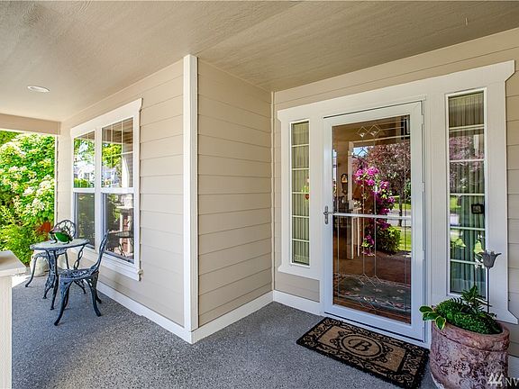 Covered front porch. Perfect spot to sit outside and sip tea??