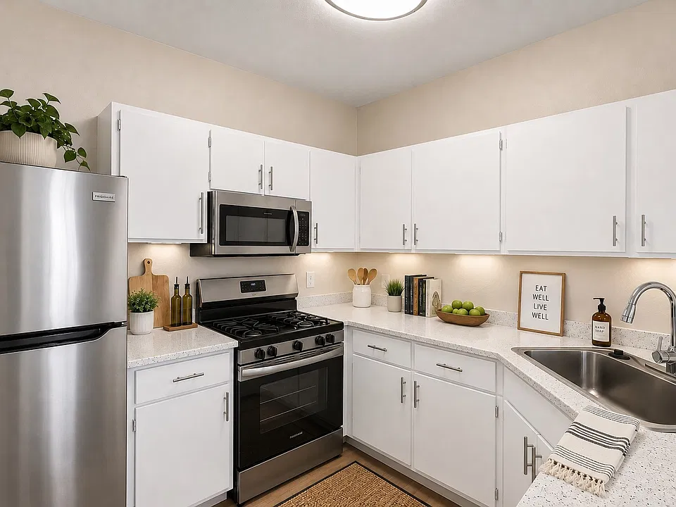 Step into the inviting kitchen of Serena Shores, featuring modern stainless steel appliances, sleek countertops, and ample storage space. Perfect for culinary creations and gatherings. Schedule a visit today to see it for yourself!