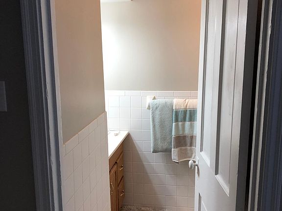 Bathroom entrance one step down.