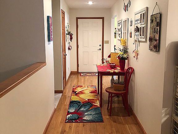 Hallway facing front door.