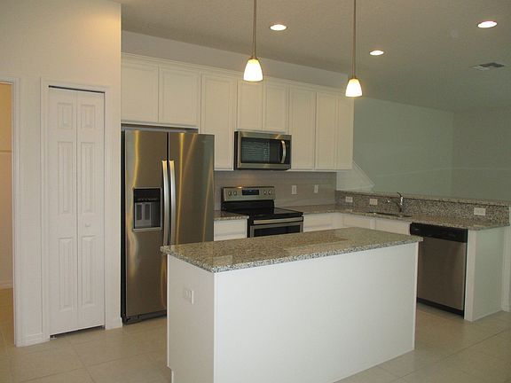 3rd image of 6995 Tussilago Way