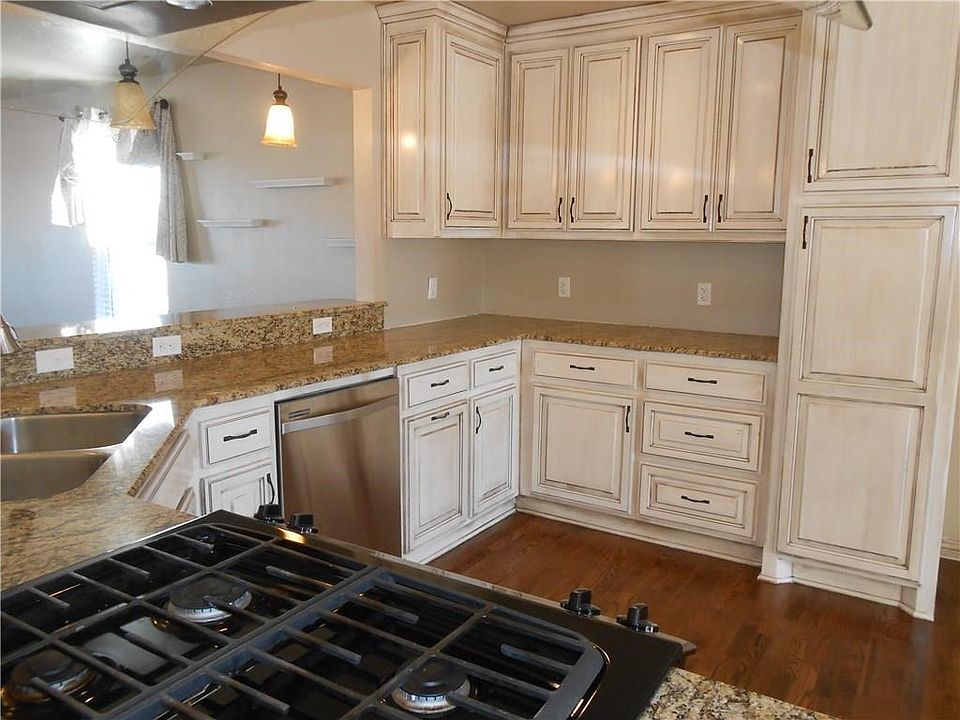 Custom built on site cabinetry, gas range, beautiful wood floors.  You will be impressed, I promise!