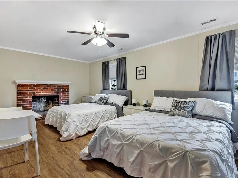 4th bedroom with 2 Queen beds. Fireplace is not functional.