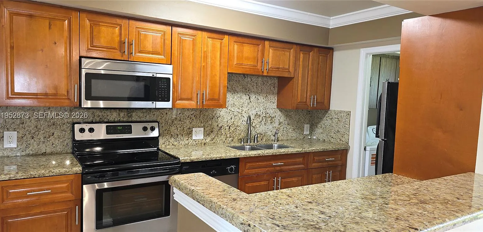 Kendall Acres West Condo — Photo 1