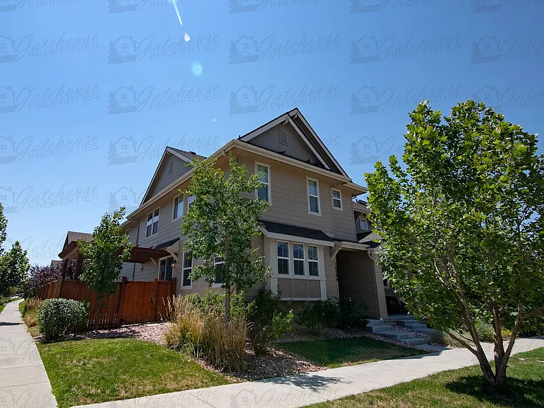 10294 E 59th Ave — Photo 1