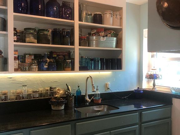 Kitchen, simple galley style, recent granite countertops