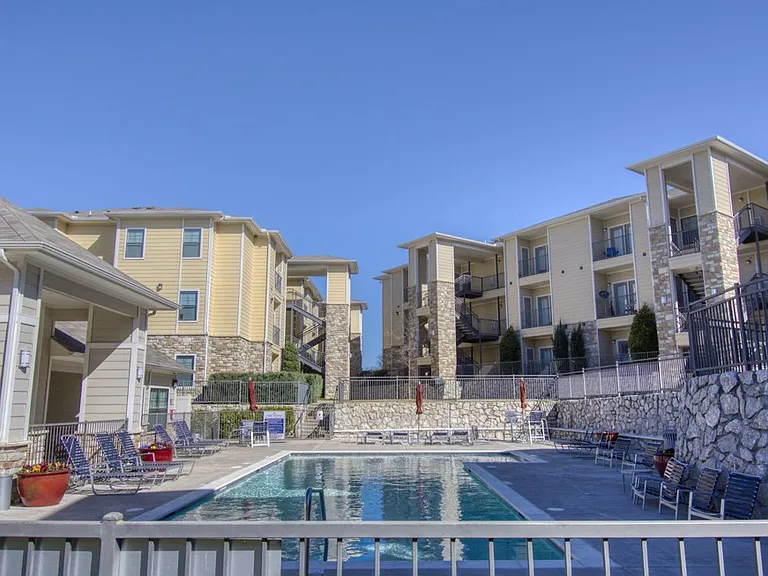 Relaxing pool area with lounge seating