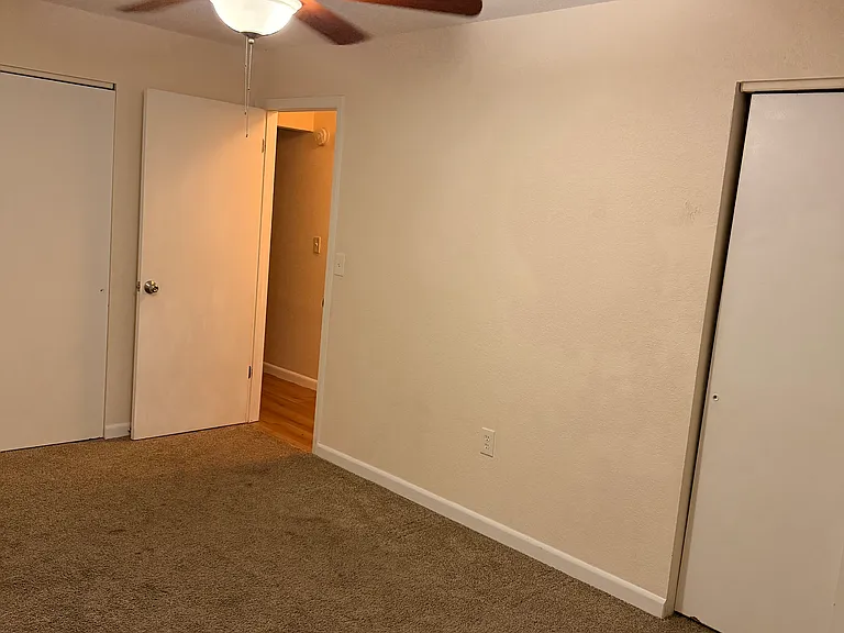 bedroom 1 with two closets