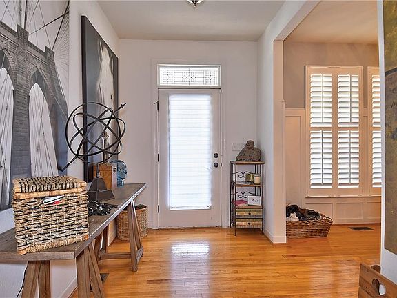 Open foyer with beautiful hardwood floors.