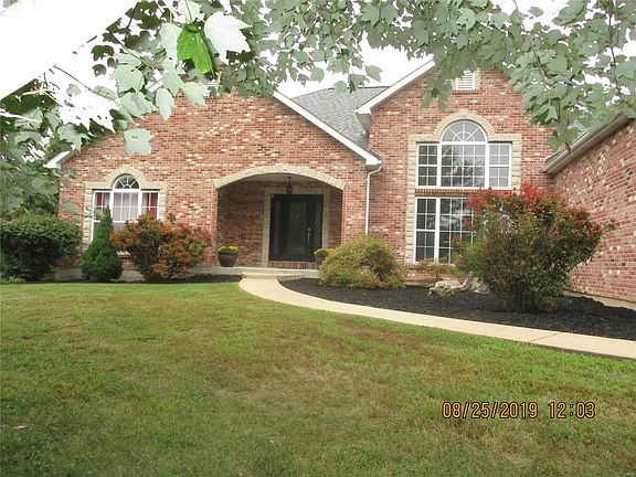 Level walkway entrance to this beautiful ranch home