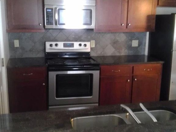 Kitchen - photo from mirror image unit on other side of buil