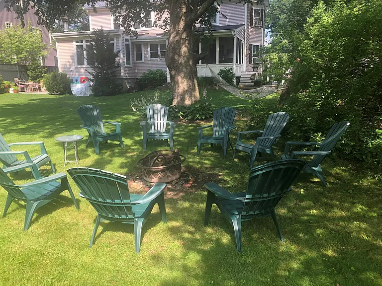 Huge, flat yard with playset, and firepit. Enjoy it year round!