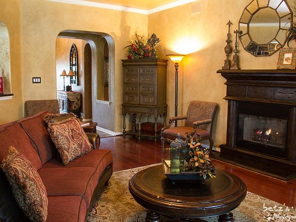 Even the fireplace has been elegantly appointed with custom faux paint