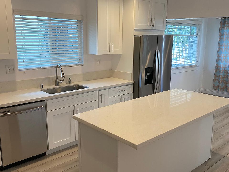 Quartz Kitchen with Stainless appliances