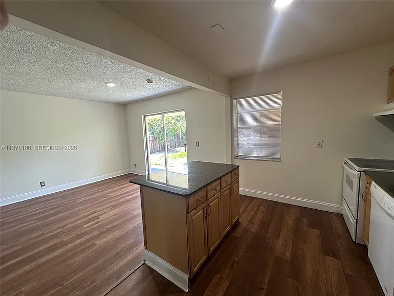 3033 NW 68th St #12E — Photo 8
