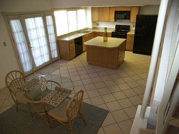 Full kitchen remodel in 2006 thoughtfully creates the most efficient of spaces. You'll love working and entertaining in a kitchen with this much storage: Large walk-in pantry and custom cabinets include cupboards and drawers everywhere you need them.