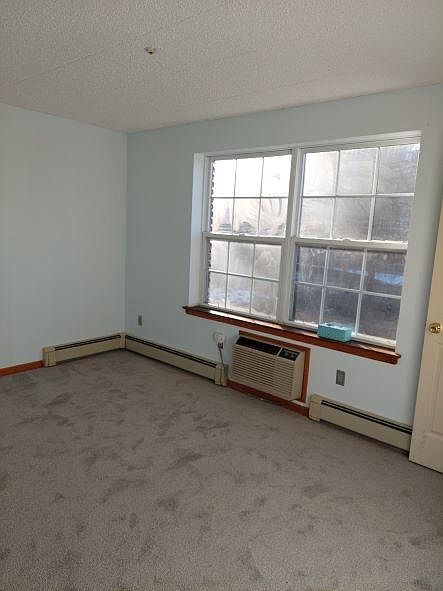 Bedroom photo from hallway vantage point