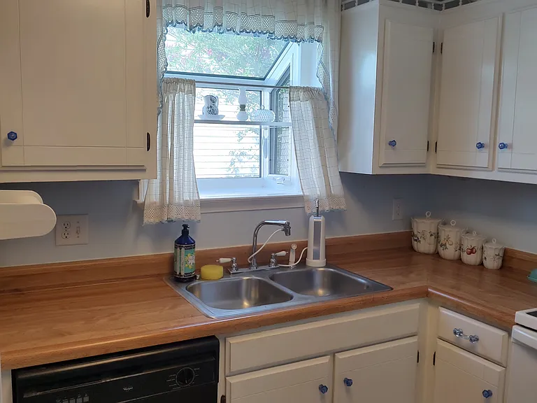 A cute little window great for a herb garden over the kitchen sink!