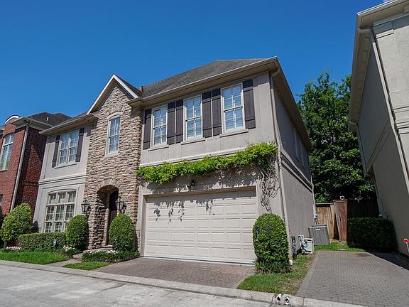 Curb appeal galore! Immaculate landscaping and mature trees give this charming home a welcoming feel from the moment you pull up.