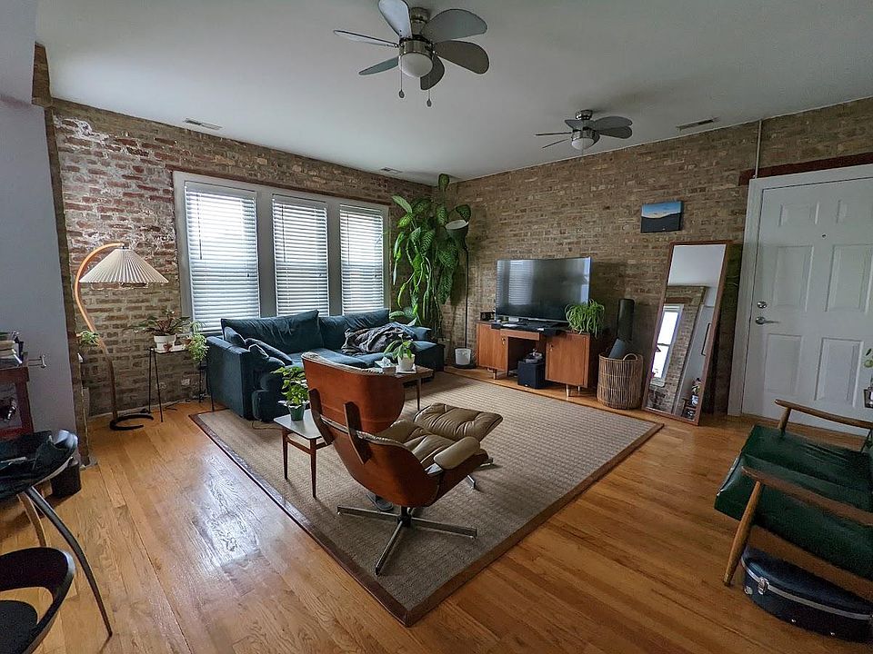 Living Room: open floor plan with West facing windows
