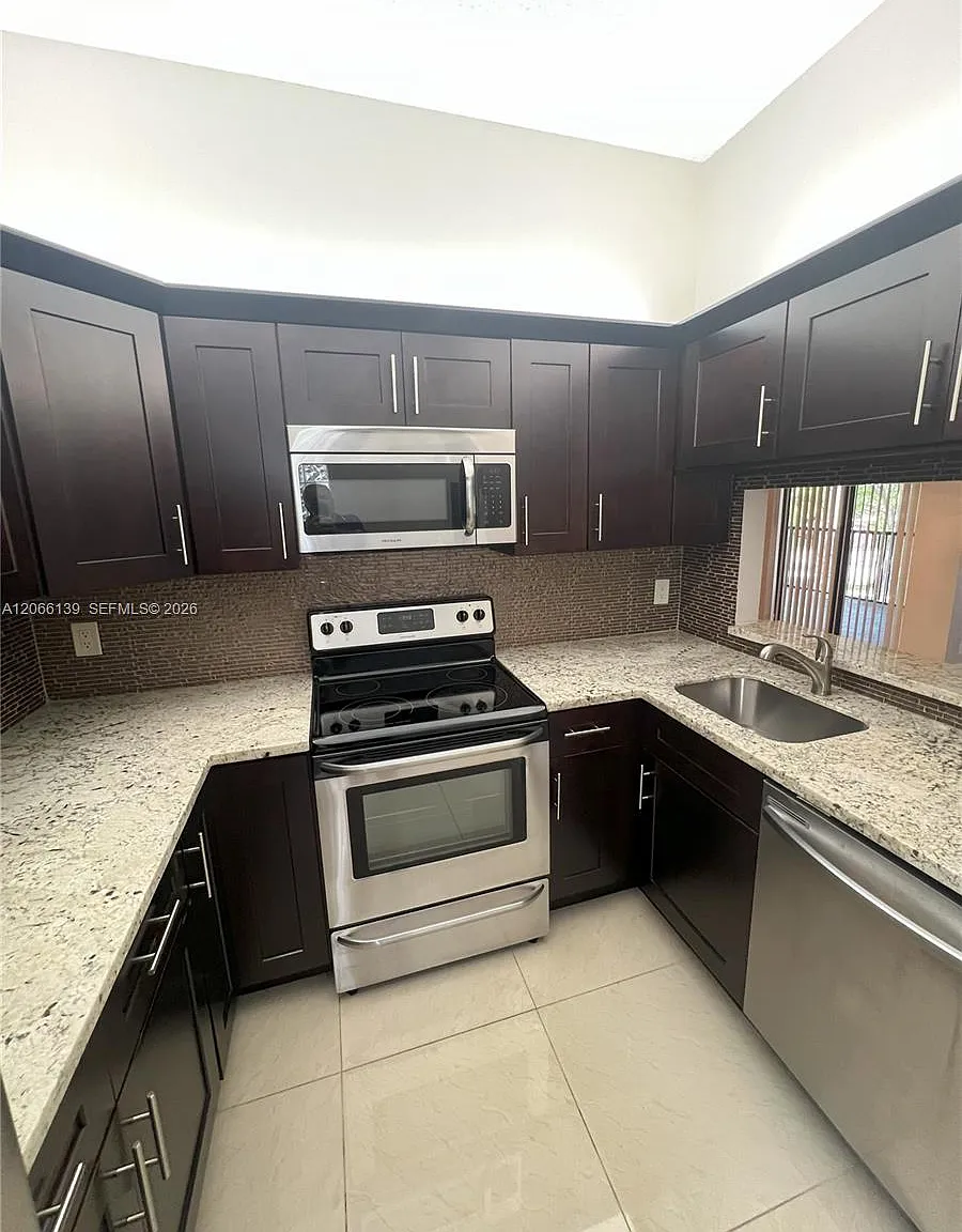 Optima Village I-C Condo — Photo 3