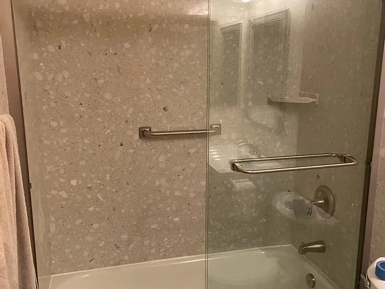 3 full bathrooms, one bedroom and one full bathroom downstairs
