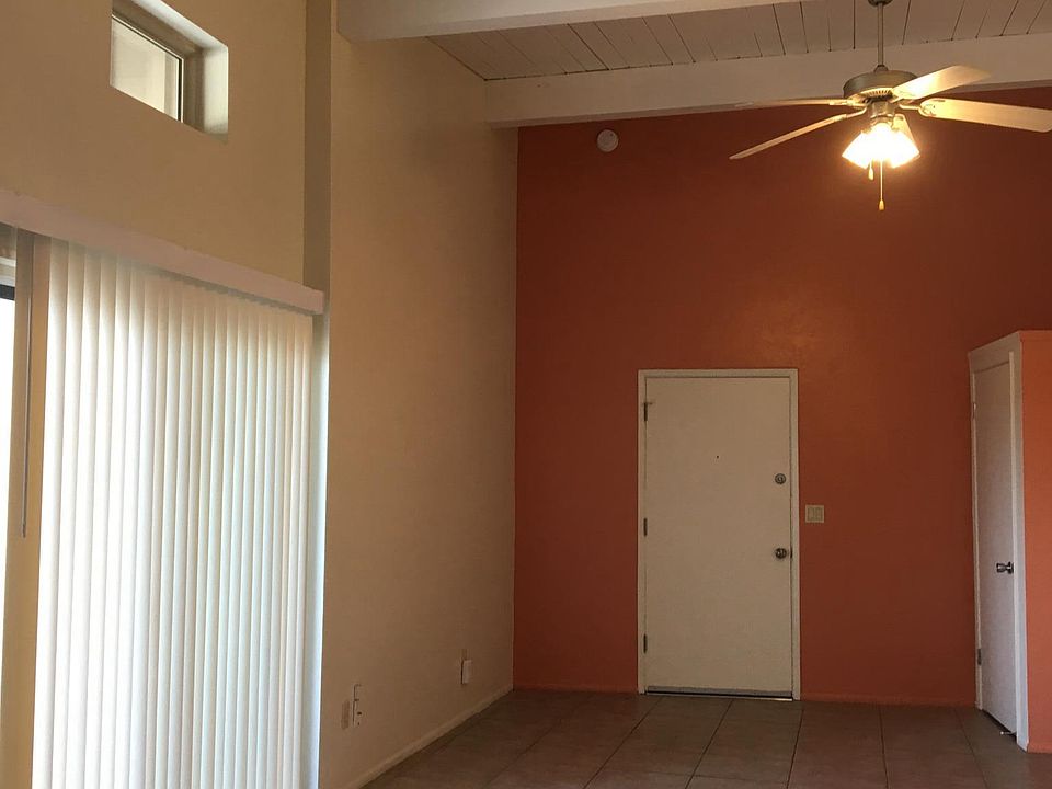 12 by 20 foot living/dining area with vaulted ceiling.