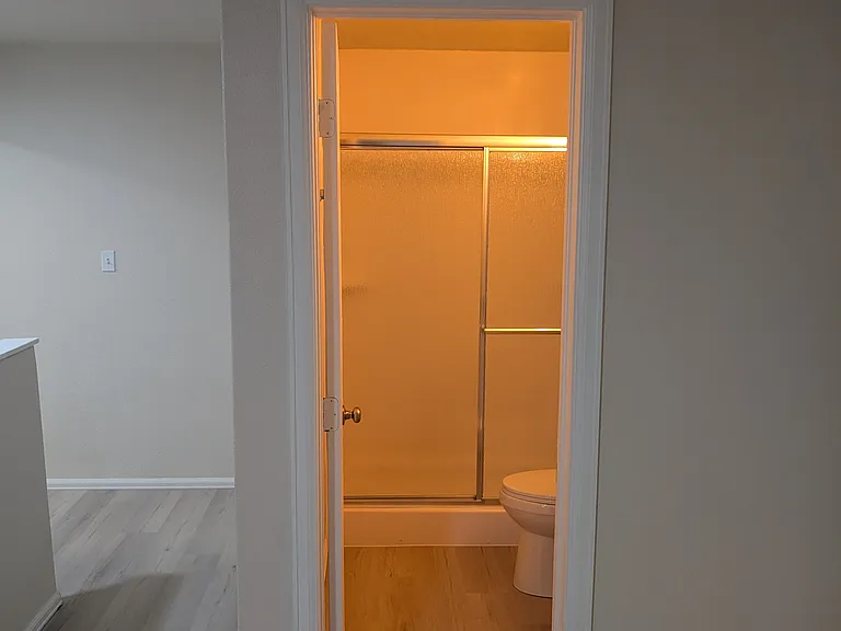 secondary upstairs bathroom also with walk in shower