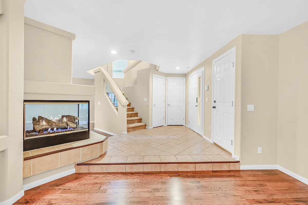 Double sided gas fireplace. - 10966 Ladyburn Ct