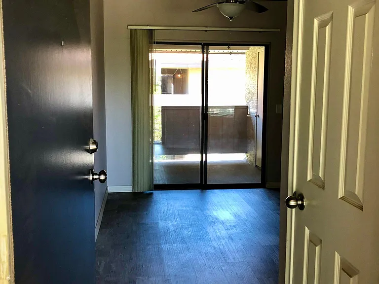 entry way with a coat closet on the right