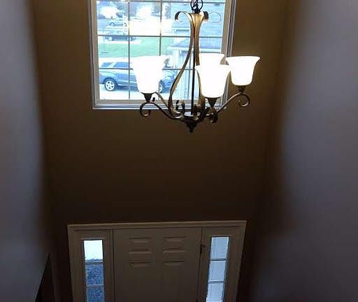 Vaulted Foyer w/Chandelier.