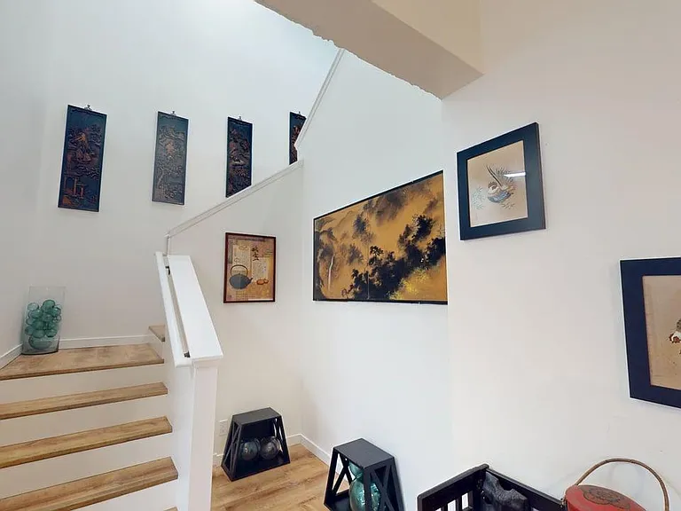 Newly remodeled stairs to new second floor