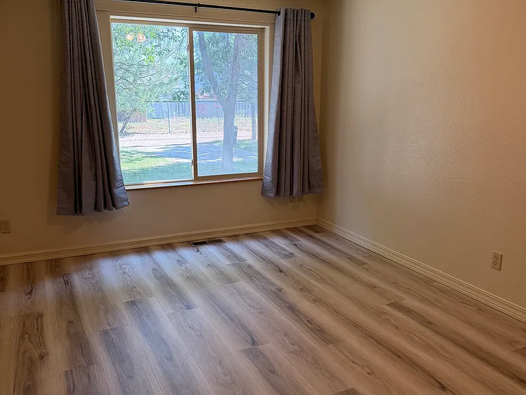 Living room with view to back yard.