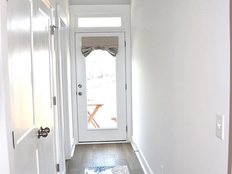 2nd floor hallway that leads to screen patio.