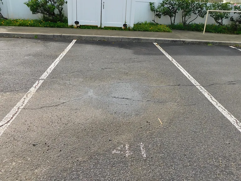 Assigned uncovered parking stall.