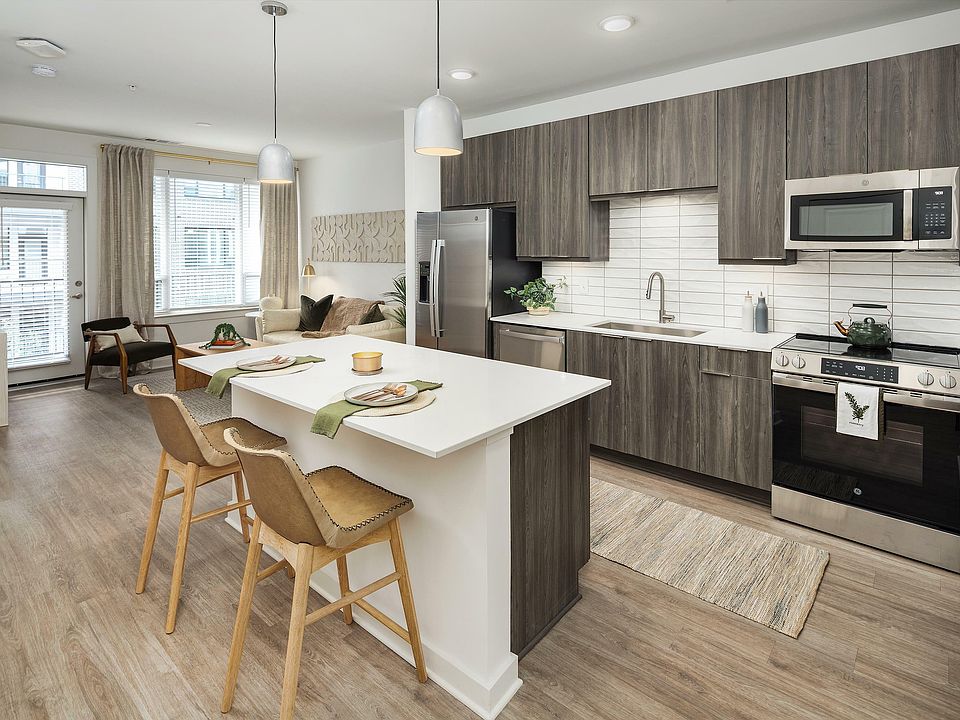 Experience the elegance of this chic urban kitchen, perfect for modern living.