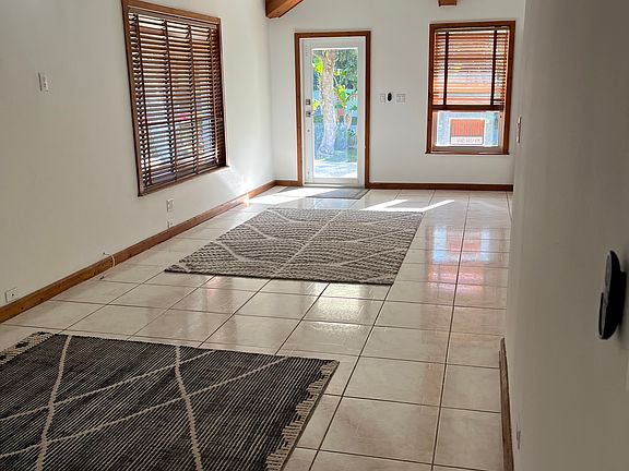 High vaulted ceilings make area impressive!