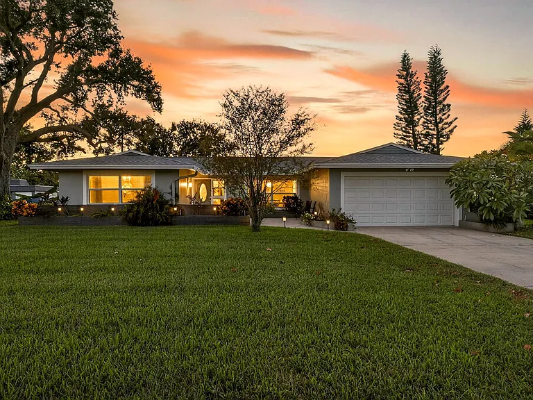 Beautiful large corner lot, offering extra privacy. Two car garage.