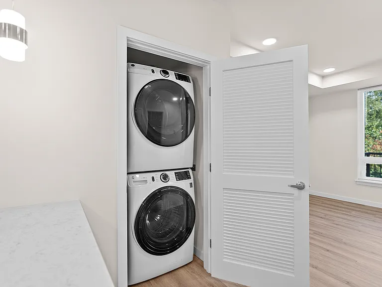 Full Size Stack Washer and Dryer In Each Home