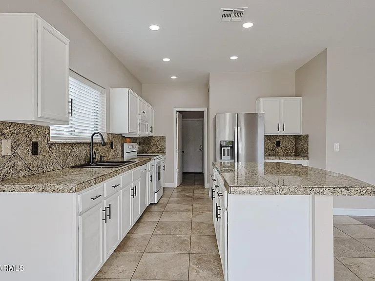 15569 W Gelding Dr — Photo 12