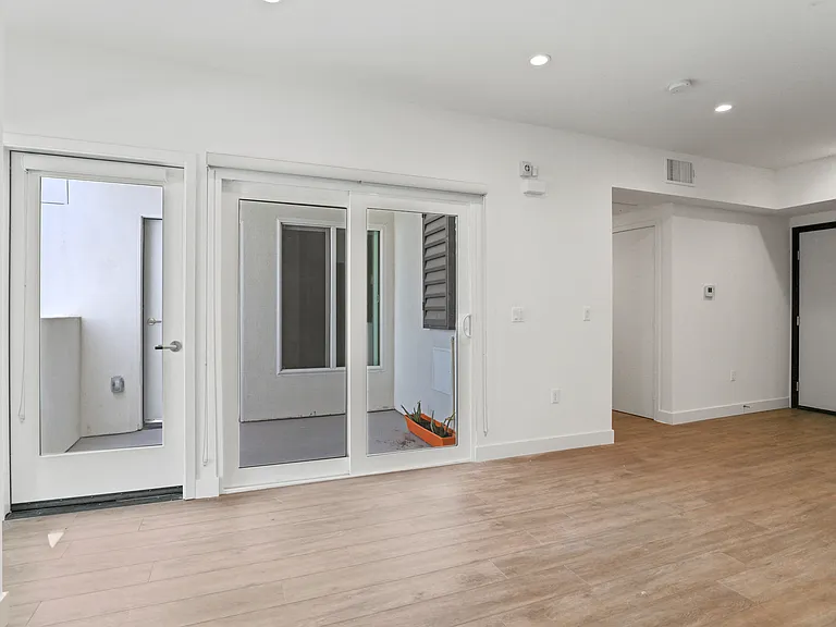 Living Room with Spacious Patio Area